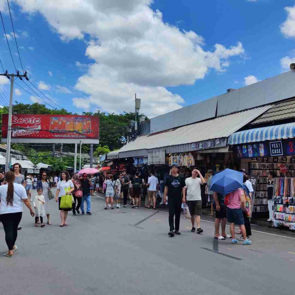 A view of the colorful stalls at Chatuchak Weekend Market, a must-visit for any Muslim's guide to Bangkok.